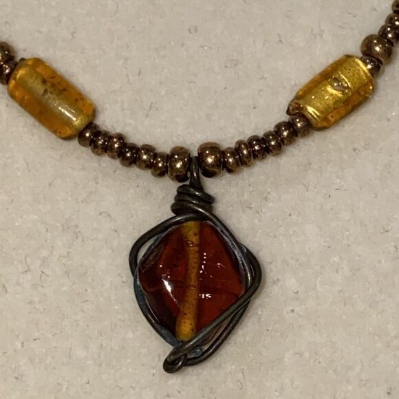 Vintage Boho Beaded Necklace with Drop Dangle Caged Bead Brown and Gold Accents - Picture 7 of 11